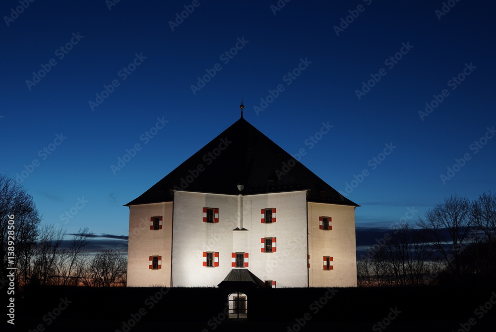 Fototapeta premium Famous landmark Letohradek Hvezda (chateau Star) on the White Hill in Prague, Czech Republic, during the sunset as a symbol of historical building in Eastern Europe 