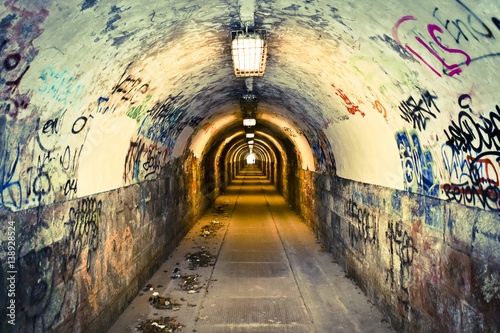 Canvas Print Old, abandoned and long tunnel for passengers