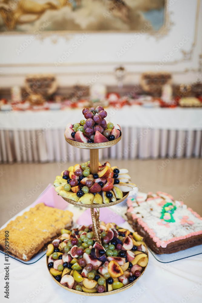 wedding buffet table with a variety of juicy fruits