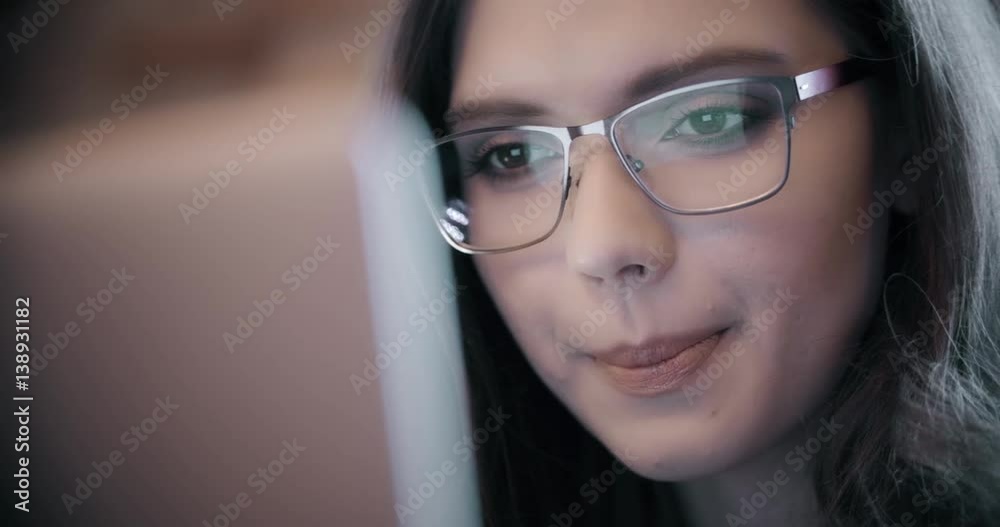 young woman writes a message to her boyfriend in the morning in the cafe with a cup of coffee, positive emotions, smile, close-up