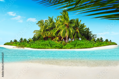 Whole tropical island within atoll in Indian Ocean and blank sand on a tropical island.