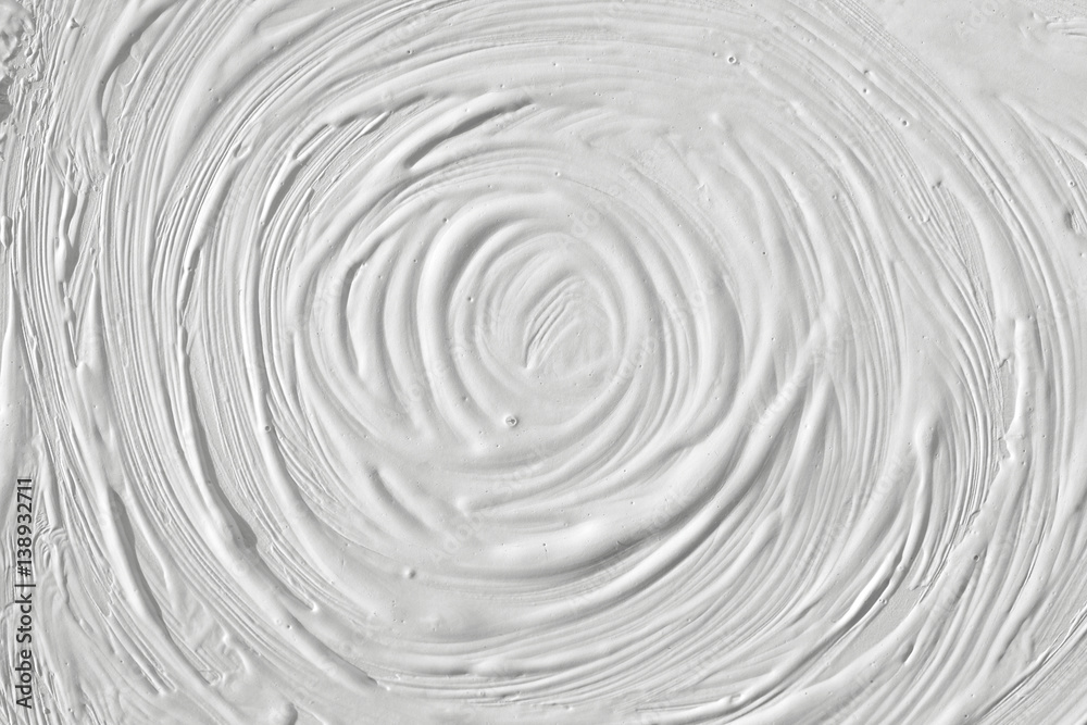 Texture of white paint on wall background. Circles under the natural light in a retro style. Texture of white paint on wall background. Circles under the natural light in a retro style.