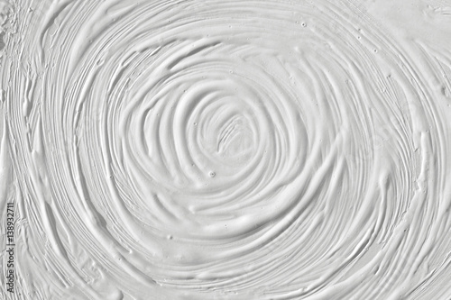 Texture of white paint on wall background. Circles under the natural light in a retro style.