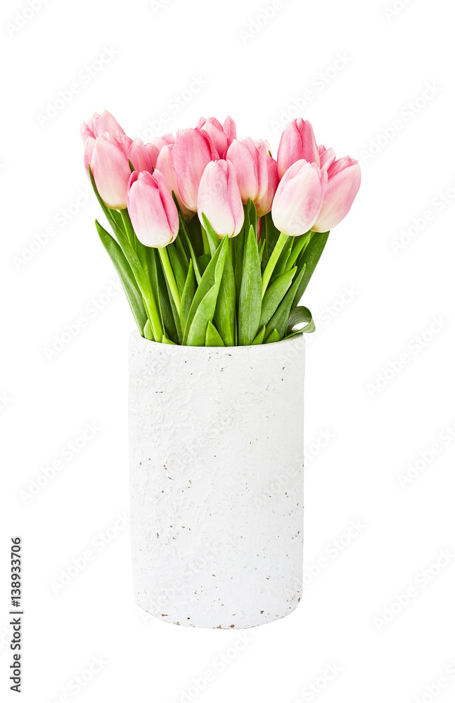 Pink tulips bouquet in old white vase. Isolated over white background Pink tulips bouquet in old white vase. Isolated over white background