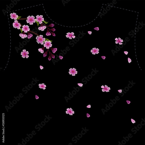 Embroidery blossoming cherry branches on a black background