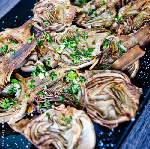 artichokes baked with oil, parsley and lemon photo