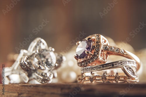 Diamond rings over wood table