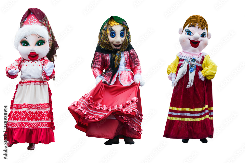 Women in Russian traditional national costume wearing a doll head on a white background