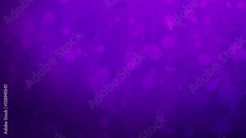 Abstract purple background with floating particles. Seamlessly loopable animation.