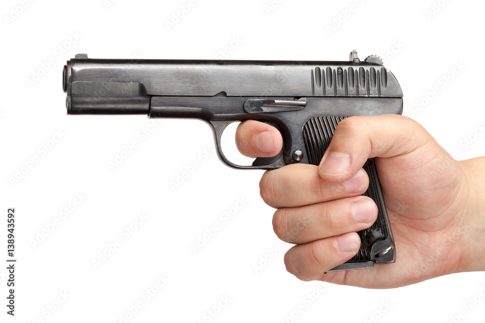 Men's hand with a gun isolated on white Men's hand with a gun isolated on white