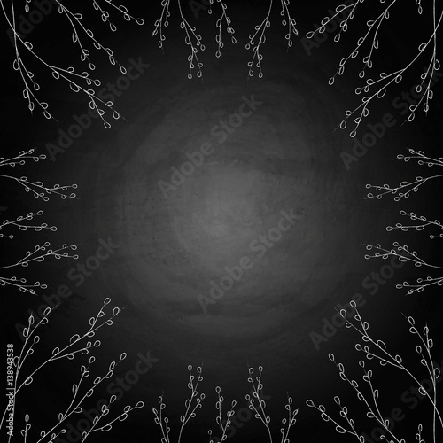 Easter background with willow branches on chalkboard