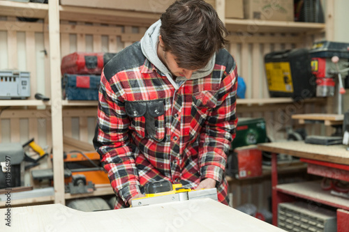 Carpenter in his workshop