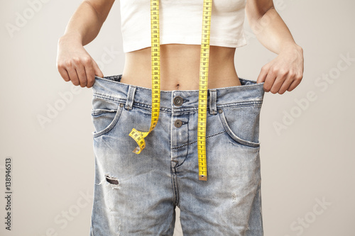 Weight loss woman with bluejeans