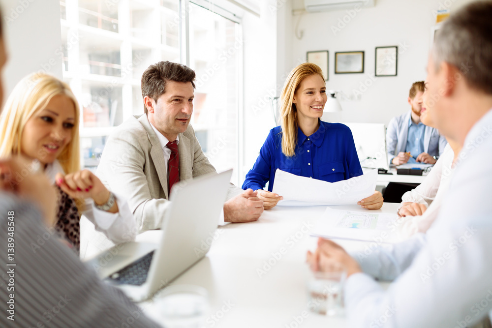 Businesspeople collaborating in office Businesspeople collaborating in office