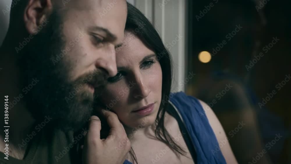 desperate young woman cries on the shoulder of partner desperate young woman cries on the shoulder of partner