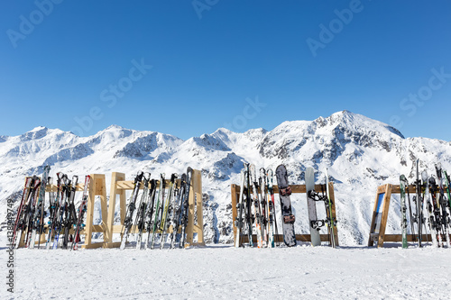 Skis on a rack outside a mountain restaurant in Obergurgl photo