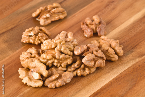 Walnuts on wooden board