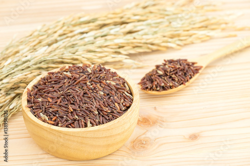 Germinated brown rice on wooden table background., GABA rice. photo