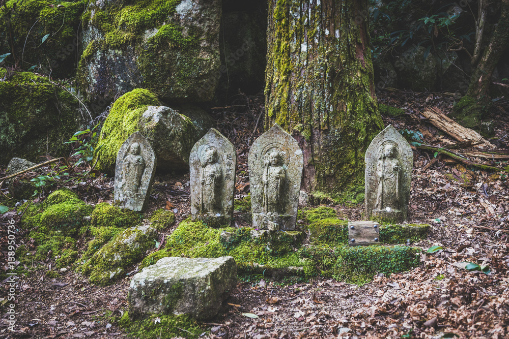 Japan, Miyajima, Buddha statues at the wayside Japan, Miyajima, Buddha statues at the wayside