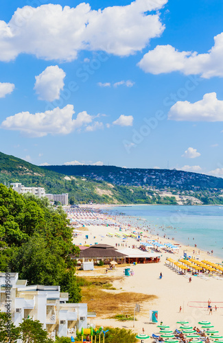 The Black Sea shore, blue clear water, beach with sand, umbrellas and sunbeds. Albena, Bulgaria © Nikolai Korzhov