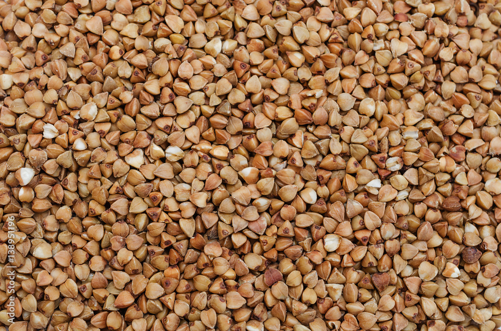 Buckwheat groats. Food background. Photo Wallpaper. Buckwheat groats. Food background. Photo Wallpaper.