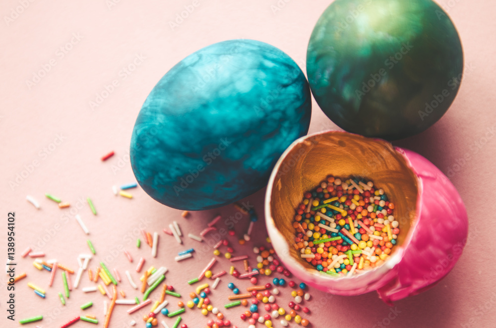 colorful easter eggs with confectionery sprinkling