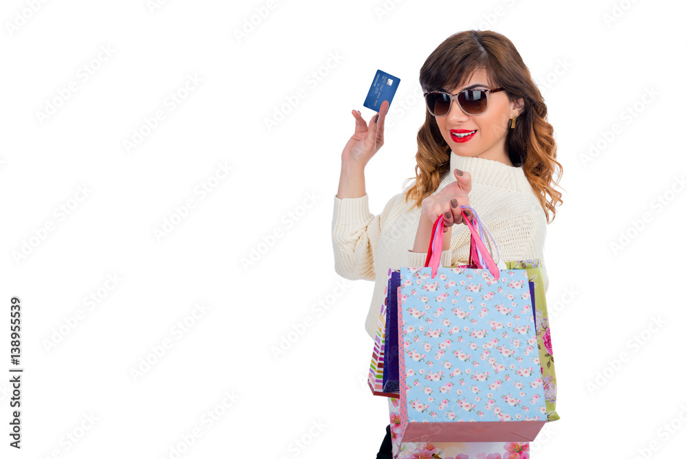 Happy woman with shopping bags and credit card. Happy woman with shopping bags and credit card.
