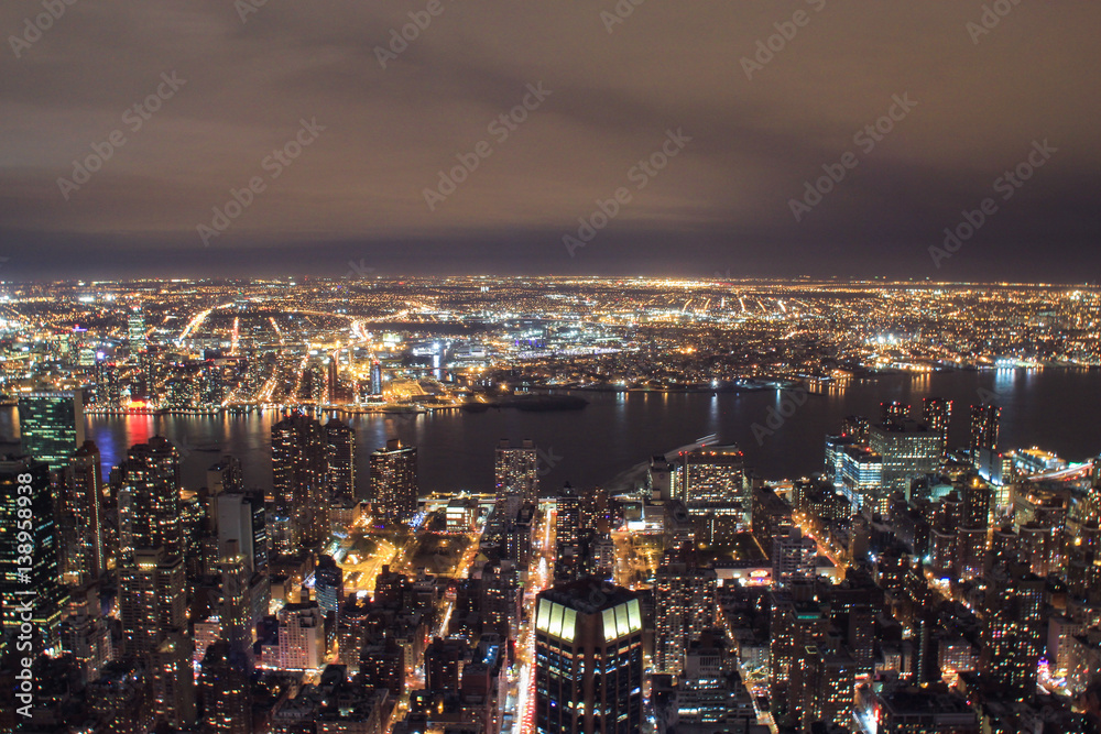 Fototapeta premium Aerial view of New York City at night