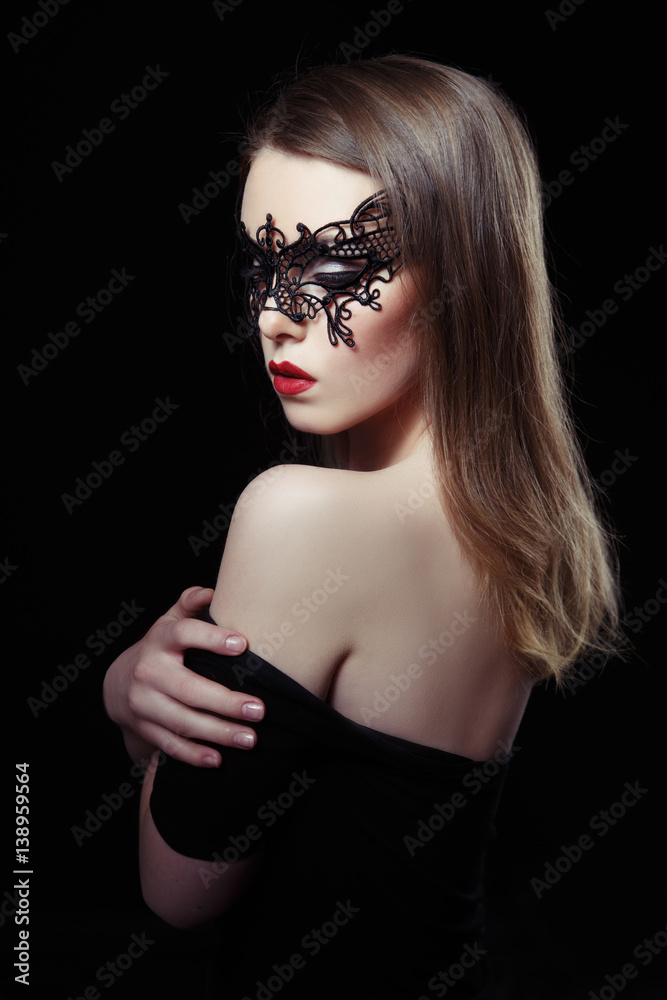 Beauty portrait of sexy mysterious woman in lace mask on a black  background. Stock Photo | Adobe Stock