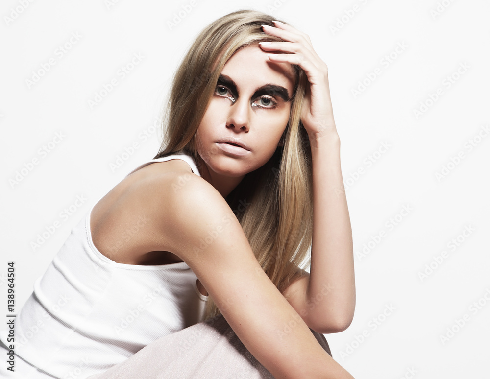 Obraz premium fashion model posing on light background 