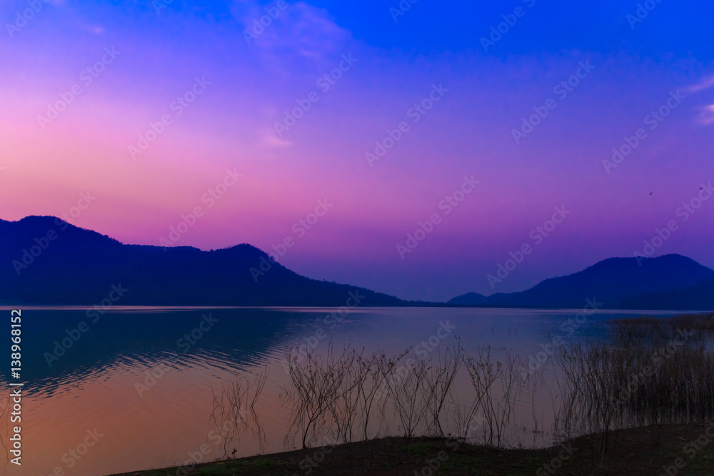Fototapeta premium Sunrise sky over the lake in the morning. Thailand.