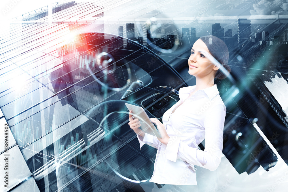 Attractive business lady working on tablet . Mixed media Attractive business lady working on tablet . Mixed media