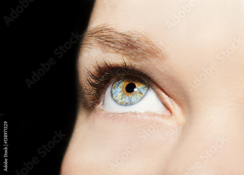 Fototapeta Naklejka Na Ścianę i Meble -  A beautiful insightful look woman's eye. Close up shot