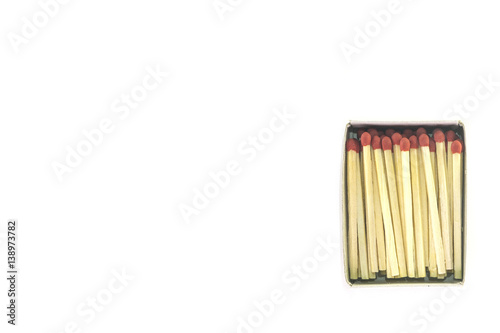 Open box of matches with red head on white background