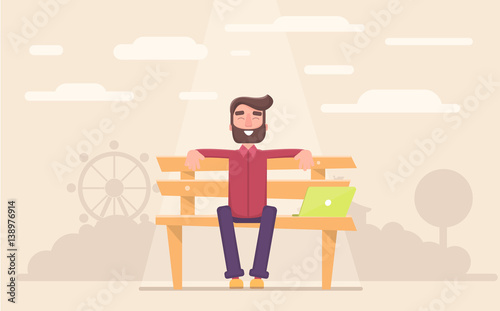 Freelancer happy sitting in the park taking a break at work.