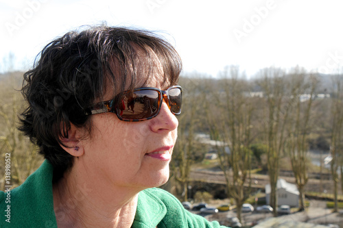 portrait of mature woman with sunglasses