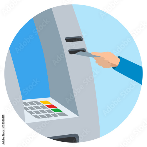 Hand inserting credit card into the atm slot