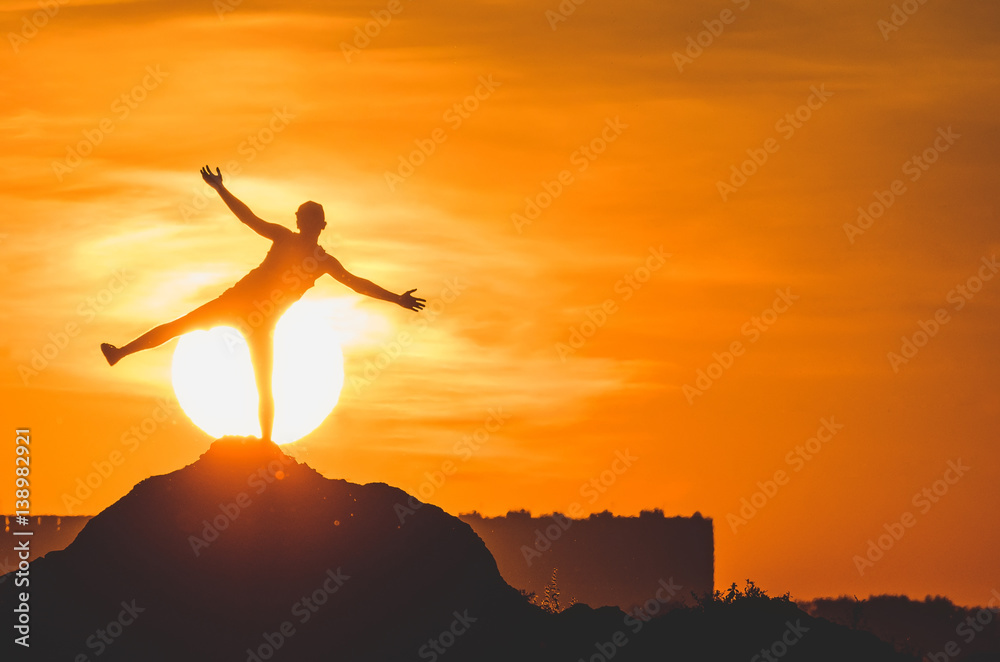 Human silhouette jumping at solar disk sunny summer sunset drive holidays and vacations