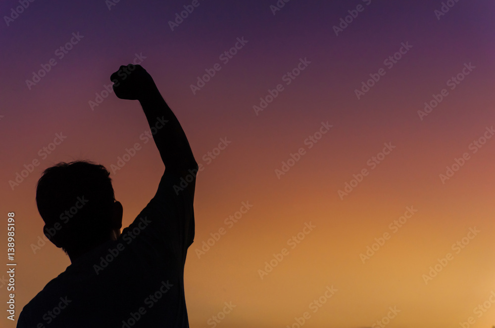 Silhouette of happy victory man