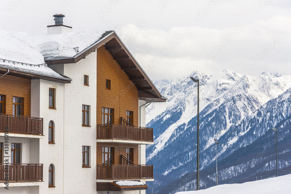 Sochi Rosa Khutor Hotels in the snowy mountains, snowboarders and skiers, January 2017
