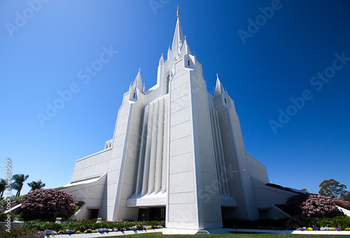 Mormon temple against a clear blue sky photo