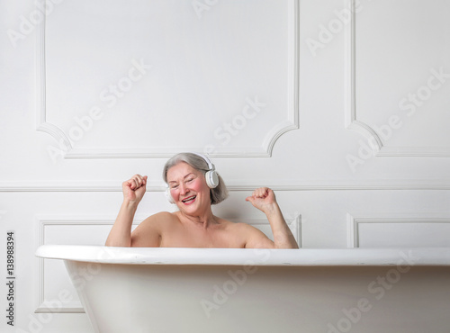 Grandma dancing in the bathtub photo