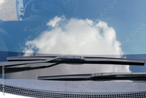 Windshield wipers of a white car