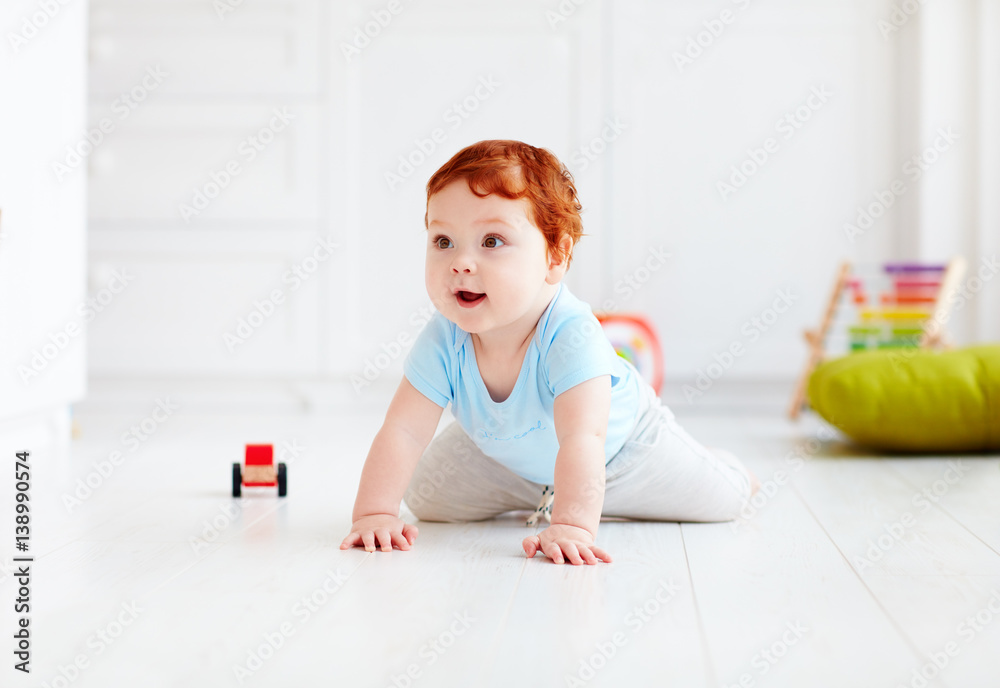 cute infant baby crawling on the floor at home cute infant baby crawling on the floor at home