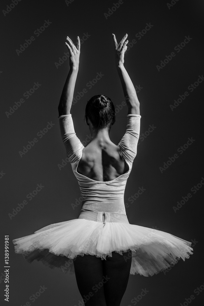 Fototapeta premium Young beautiful dancer posing in studio