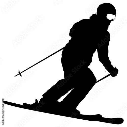Mountain skier speeding down slope. Vector sport silhouette