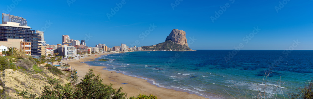 Panoramic view of Mediterranean beach and Ifach Mount in Calpe, Southern Spain