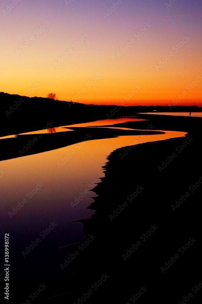 Fototapeta premium sunset at the seaside during outflow
