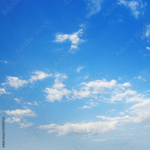 Cirrus clouds against a blue sky.