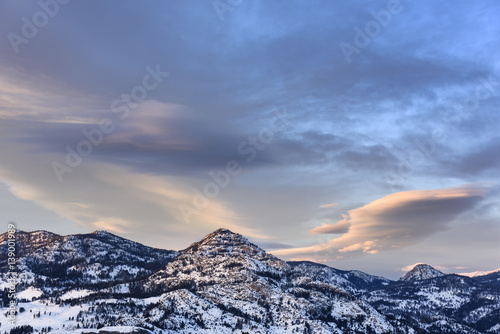 Snow Covered Mountain Range at Sunset